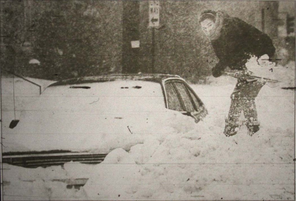 Rachel Armstrong of Duluth tries to dig her car out of deep snow on Nov. 1, 1991, during the worst of the Halloween blizzard. (Bob King / News-Tribune)