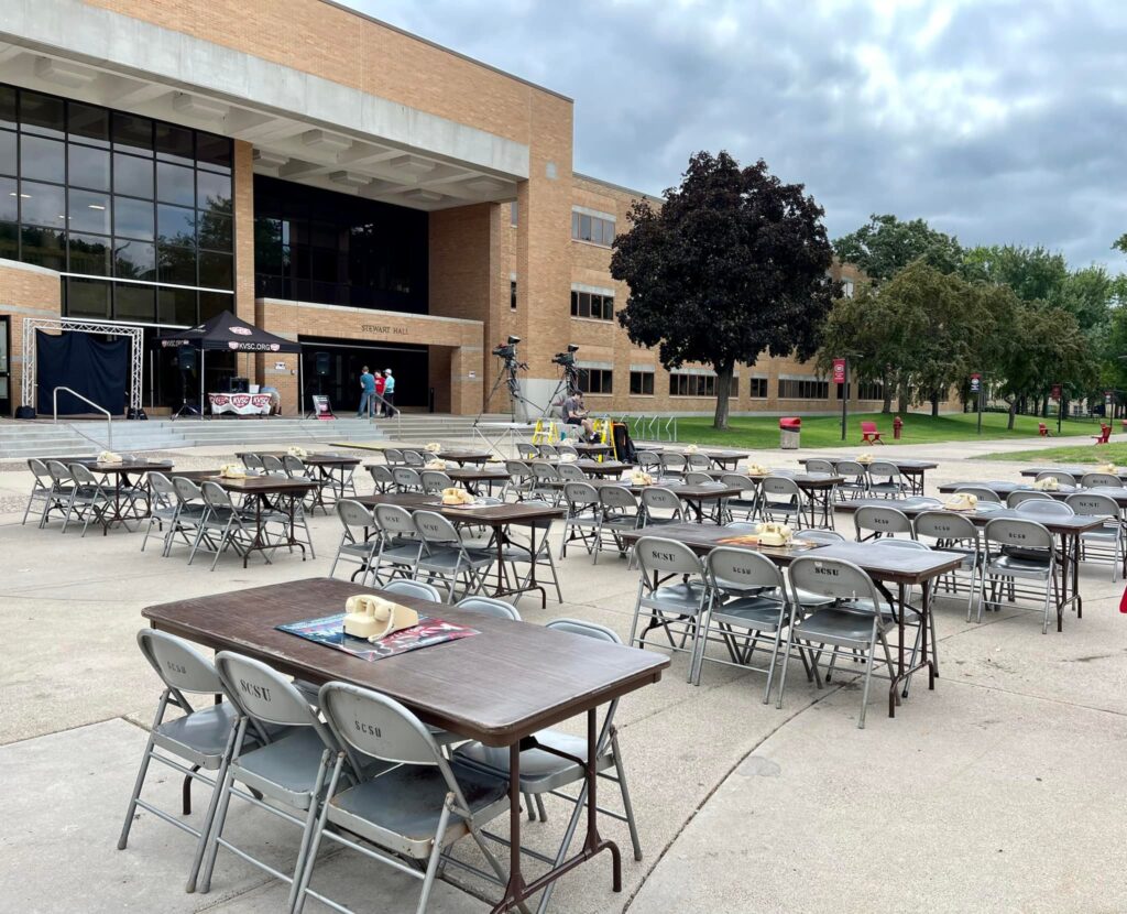 Tables and chairs set up outside of Stewart Hall for the annual Trivia Theme Reveal party