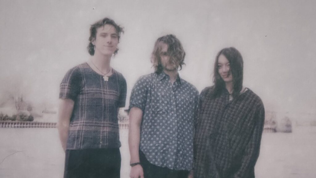 An artfully blurry picture of the band Willem Dafoe Fanclub