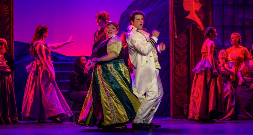 Actress playing Anna and actor playing Hans dance back to back during "Love in an Open Door" number in "Disney's Frozen" production with GREAT Theatre.